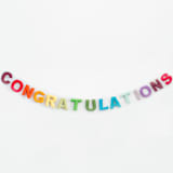 "Congratulations Banner (Rainbow, 6 feet)" - Garlands in multicolor by Nivas Collection