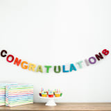 "Congratulations Banner (Rainbow, 6 feet)" - Garlands in multicolor by Nivas Collection