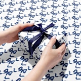"Blue and White Bow Gift Wrap [Roll of 3 Sheets]" - Holiday Gift Wrap in blue by Liesel Anne