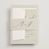 "Tilted Script" - Wedding Invitations in Ivory by Hannah Williams - Assembled with Belly Band