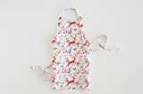 "Jumping Reindeer" - Personalizable Children's Apron in Red by Phrosné Barwood - Apron without personalization