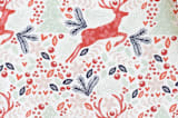 "Jumping Reindeer" - Personalizable Children's Apron in Red by Phrosné Barwood - Fabric Detail