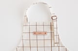 "Montauk" - Personalizable Children's Apron in Cocoa by Carolyn Nicks - Tag in Bodoni Regular