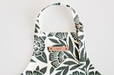 "Block Print Floral" - Personalizable Children's Apron in Dark Teal by Katharine Watson - Tag in Bodoni Regular