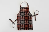 "Sketched Quilt" - Personalizable Children's Apron in Rust by Alethea and Ruth - Personalizable Apron