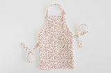 "Enchanted Holiday" - Personalizable Children's Apron in Cinnamon by Teju Reval - Apron without personalization