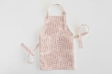 "Deco Arches" - Personalizable Children's Apron in Pink by Hooray Creative - Apron without personalization
