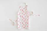 "Festive FaLaLa" - Personalizable Children's Apron in Red Berry by Hooray Creative - Apron without personalization