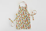 "Field of Florals" - Personalizable Children's Apron in Scarlet by Kelsey Carlson - Apron without personalization