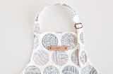 "Minimalist circles" - Personalizable Children's Apron in Navy by Sabrin Deirani - Tag in Bodoni Regular