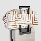 "Taos - Rust" - Weekender in Rust by Anna Elder - Trolley Sleeve