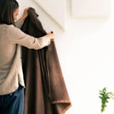 "Hay Merino Throw" - Blankets and Throws in brown by Anjali Purohit