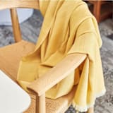 "Dandelion Merino throw" - Blankets and Throws in yellow by Anjali Purohit