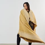 "Reyti Ochre Throw" - Blankets and Throws in yellow by Anjali Purohit