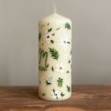 "Monogrammed Ivory with Greenery and White Floral Hand-Painted 6” Pillar Candle, Set of 1" - Candles and Holders in beige by Ashley Myers