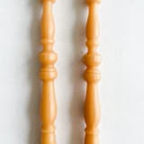 "SET OF 2 - SPINDLE LEG TAPERS // ORO" - Candles and Holders in yellow by borrowed BLU