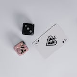 "Giant Gemstone Dice Set: Rhodonite, Dumortierite, Onyx, and Mariposita" - Decorative Object in multicolor by Powered By People