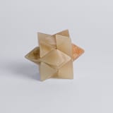 "Burr Star Puzzle in Creamy Onyx and Green Serpentine" - Decorative Object in beige by Powered By People
