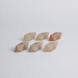 "Burr Star Puzzle in Creamy Onyx and Green Serpentine" - Decorative Object in beige by Powered By People