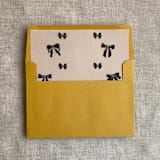 "Black ribbon bow printed vellum liner for A7 square flap envelope | pack of 10" - Envelope Liners in black by Ivory Invitations