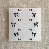 "Black ribbon bow printed vellum liner for A7 square flap envelope | pack of 10" - Envelope Liners in black by Ivory Invitations