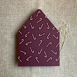 "Merlot holiday candy cane printed envelope liner for A7 euro flap envelope  | pack of 10" - Envelope Liners in purple by Ivory Invitations
