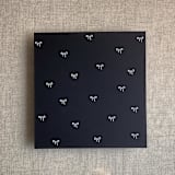 "Black baby ribbon bows envelope liner for A7 square envelope | pack of 10" - Envelope Liners in black by Ivory Invitations