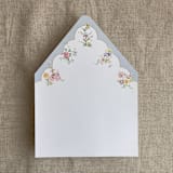 "Clara pale blue scallop floral edge printed envelope liner for A7 euro flap envelope | pack of 10" - Envelope Liners in blue by Ivory Invitations