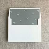 "Sage baby ribbon bows envelope liner for A7 square flap envelope | pack of 10" - Envelope Liners in green by Ivory Invitations
