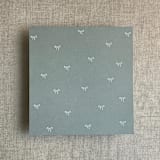 "Sage baby ribbon bows envelope liner for A7 square flap envelope | pack of 10" - Envelope Liners in green by Ivory Invitations
