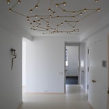"Constellation" - Ceiling Lights in brass by Richard Clarkson
