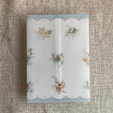 "Clara pale blue scallop floral edge printed vellum wrap for 5x7 card | pack of 10" - Invitation Jackets and Overlays in blue by Ivory Invitations