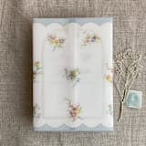 "Clara pale blue scallop floral edge printed vellum wrap for 5x7 card | pack of 10" - Invitation Jackets and Overlays in blue by Ivory Invitations
