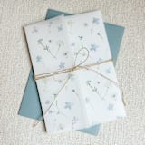 "Dusty Blue Pressed Flowers Vellum Jacket | Set of 10" - Invitation Jackets and Overlays in blue by Megan Tendler
