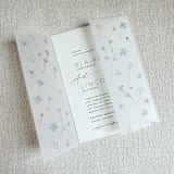 "Dusty Blue Pressed Flowers Vellum Jacket | Set of 10" - Invitation Jackets and Overlays in blue by Megan Tendler