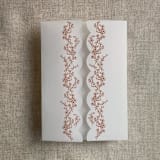 "Rust floral printed scallop edge vellum wrap for 5x7 card | pack of 10" - Invitation Jackets and Overlays in copper by Ivory Invitations