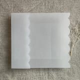 "Emberlin Scallop edge plain vellum wrap for 5x7 card | pack of 10" - Invitation Jackets and Overlays in white by Ivory Invitations