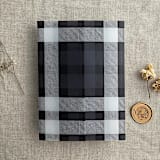 "Plaid lovers black tartan printed vellum wrap for 5x7 card  | pack of 10" - Invitation Jackets and Overlays in black by Ivory Invitations