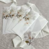 "Magnolia vellum jackets for invitations | Set of 10" - Invitation Jackets and Overlays in white by Maria Ferrer G.