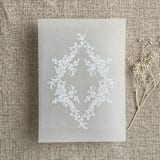 "French floral crest white ink print vellum overlay for 5x7 card | pack of 10" - Invitation Jackets and Overlays in white by Ivory Invitations