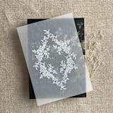 "French floral crest white ink print vellum overlay for 5x7 card | pack of 10" - Invitation Jackets and Overlays in white by Ivory Invitations