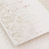 "Ivory Laser Cut Lace Jackets for 5x7 Card | Set of 10 | Envelopes Included" - Invitation Jackets and Overlays in beige by Self Stationery
