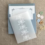 "White ribbon bow printed vellum wrap for 5x7 card | pack of 10" - Invitation Jackets and Overlays in white by Ivory Invitations