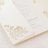 "Cream Gatefold with Intricate Laser Cut Roses for 5x7 Card | Set of 10 | Envelopes Included" - Invitation Jackets and Overlays in beige by Self Stationery