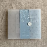 "Steel blue snow flake and forest vellum wrap for 5x7 card | pack of 10" - Invitation Jackets and Overlays in blue by Ivory Invitations