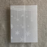 "White festive snowflake vellum wrap for 5x7 card | pack of 10" - Invitation Jackets and Overlays in white by Ivory Invitations