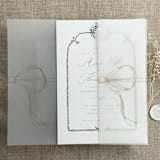 "Cashmere ribbon bow printed vellum wrap for 5x7 card | pack of 10" - Invitation Jackets and Overlays in beige by Ivory Invitations
