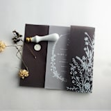 "Black Colored vellum English botanical garden floral printed vellum wrap for 5x7 card  | pack of 10" - Invitation Jackets and Overlays in black by Ivory Invitations