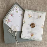"Clara green scallop floral edge printed vellum wrap for 5x7 card | pack of 10" - Invitation Jackets and Overlays in green by Ivory Invitations
