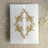"Gold print French floral crest vellum wrap for 5x7 card | pack of 10" - Invitation Jackets and Overlays in gold by Ivory Invitations